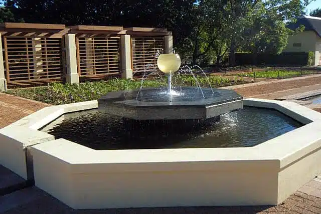 creative cascades pool services water features water in motion fountain in centre of biopond vergelegen